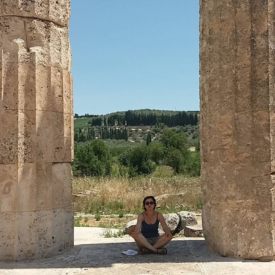 4-day Peloponnese Itinerary,Evgenia sitting in the Temple in Nemea.