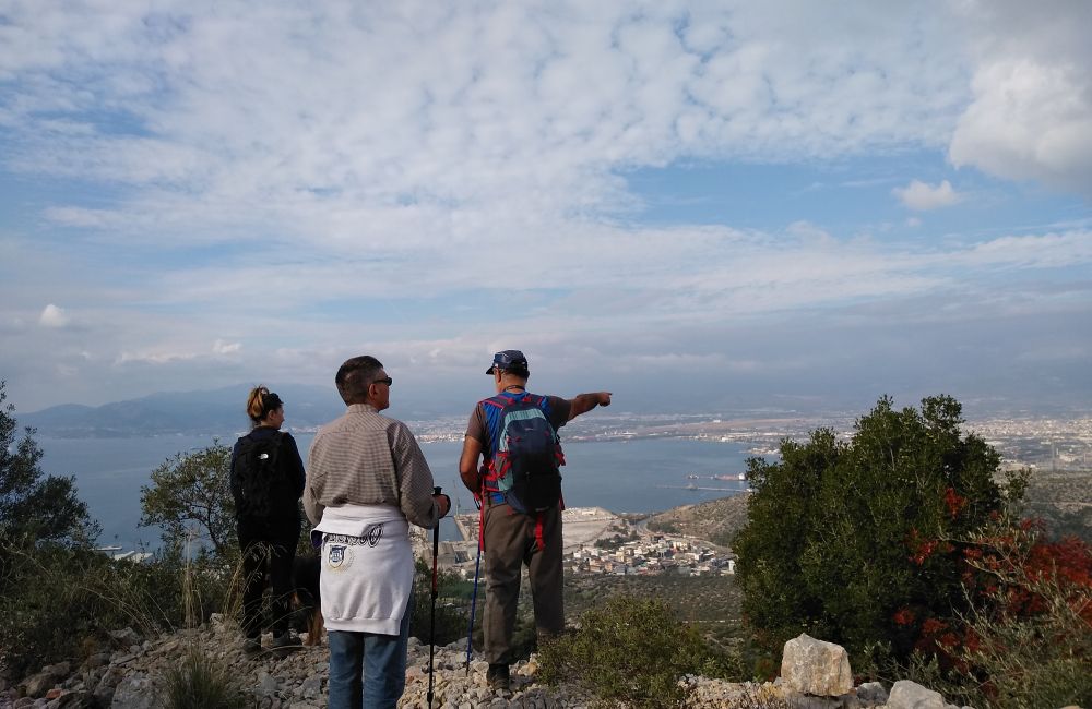 Best Hikes near Athens, hikers on Aigaleo mt overlooking the sea