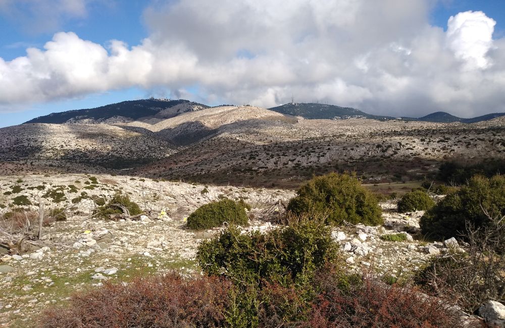 Best Hikes near Athens, The burnt side of Parnitha mt with clouds