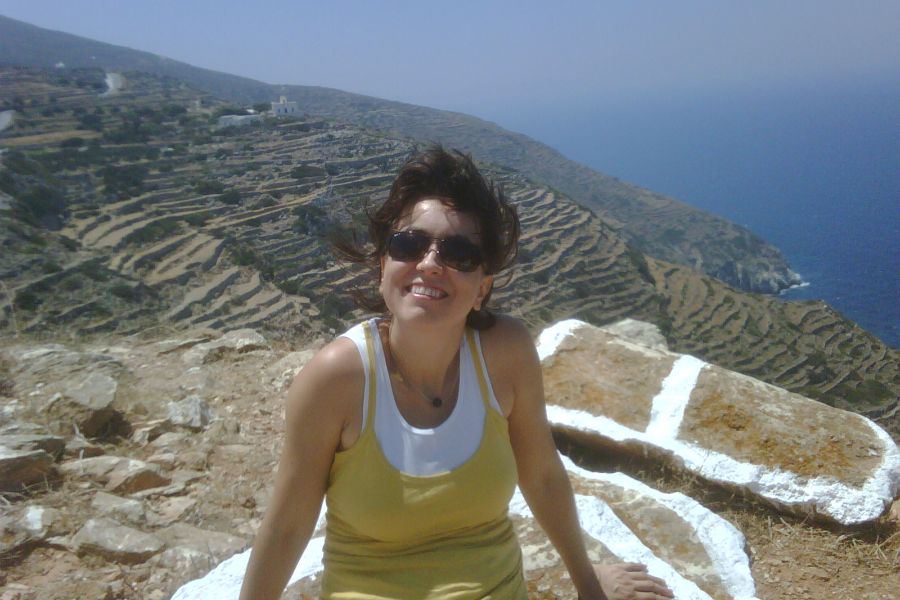 Evgenia owner of Travel the Greek Way smiling in Sikinos Greece.