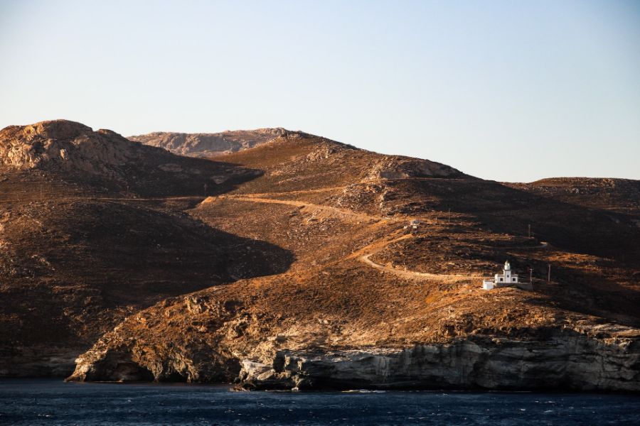 Greek Island hiking, Kythnos island , rugged mountains and remote lighthouse