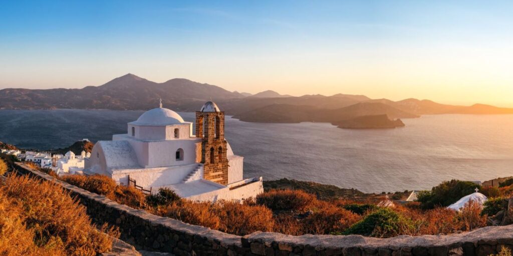 A Whitewashed Church with a Beautiful View in the Sea  in Milos Island.