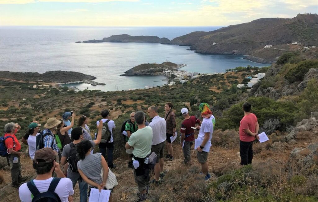 Some Hikers on The Hill Looking the view to the Sea in Kythira Island Greece.