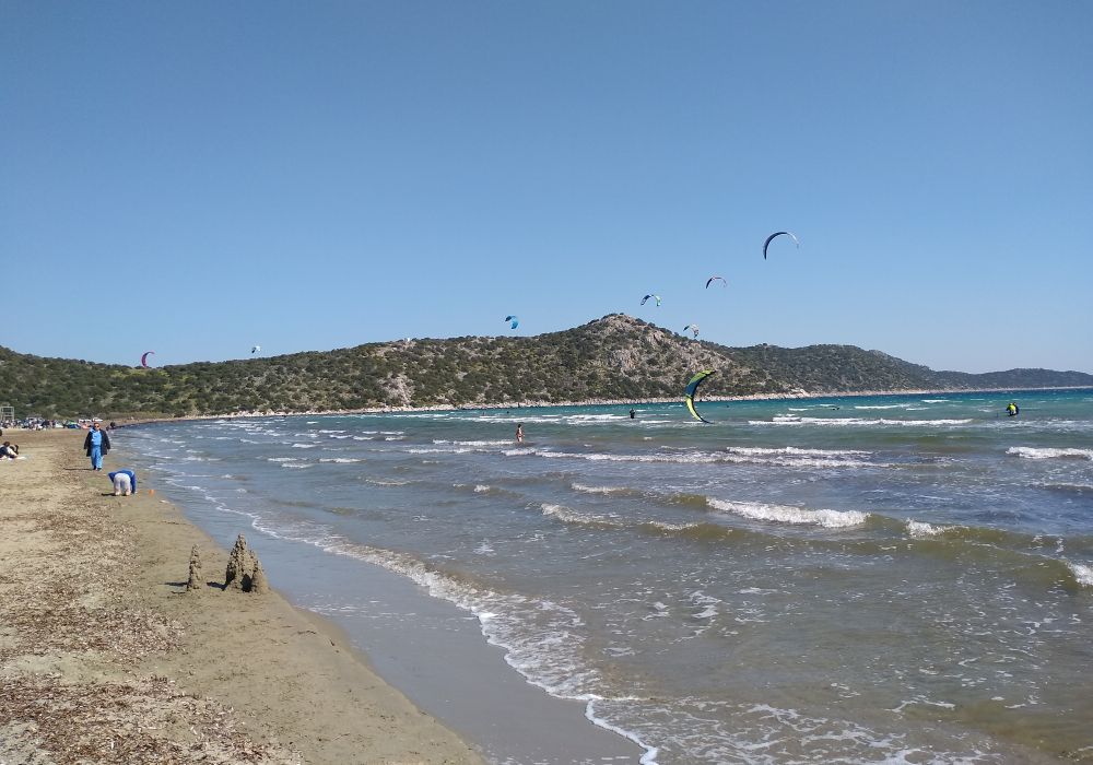 Schinias sandy beach with paragliders
