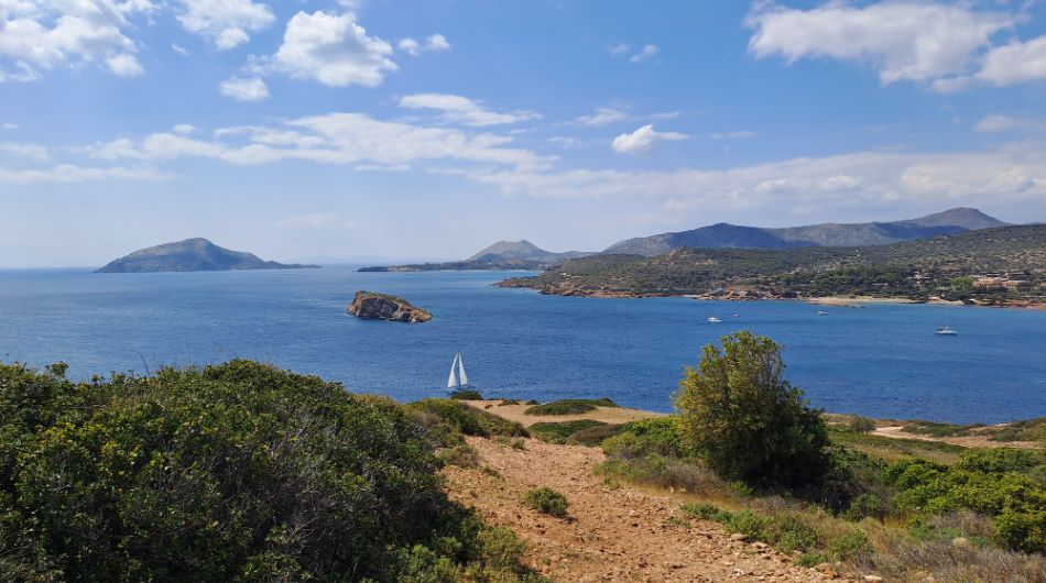 A View from Sounion Cape to the Sea and a Boat with Blue Sky in Sounion Cape Athens Greece.