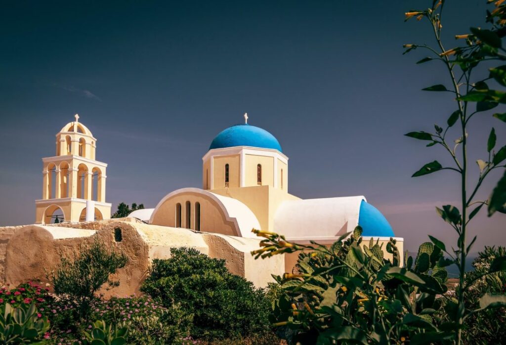 A blue domes church in a village in Megalochori