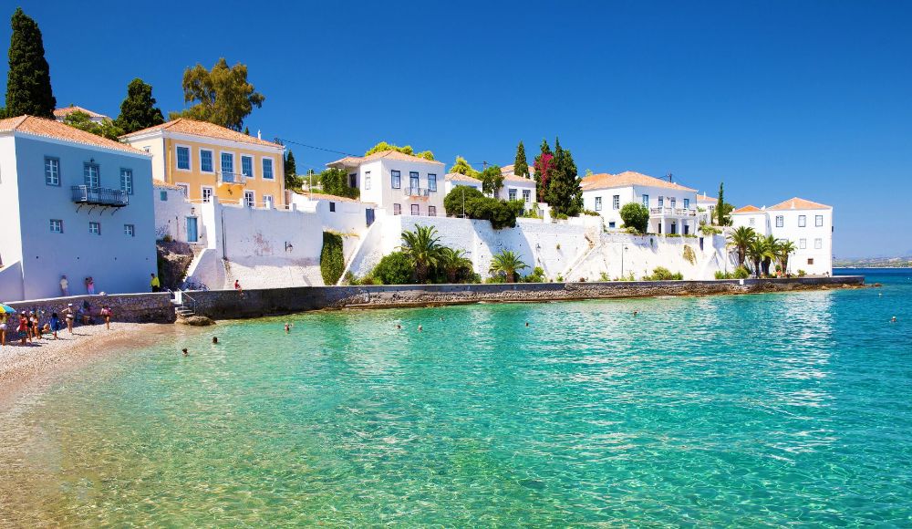 The neoclassic houses in front of the port of Spetses island in Greece in November.