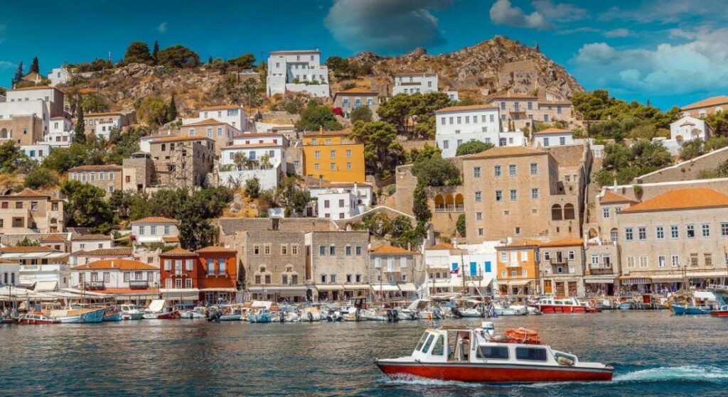 Best Places to Visit in Greece: Hydra's scenic port with yachts