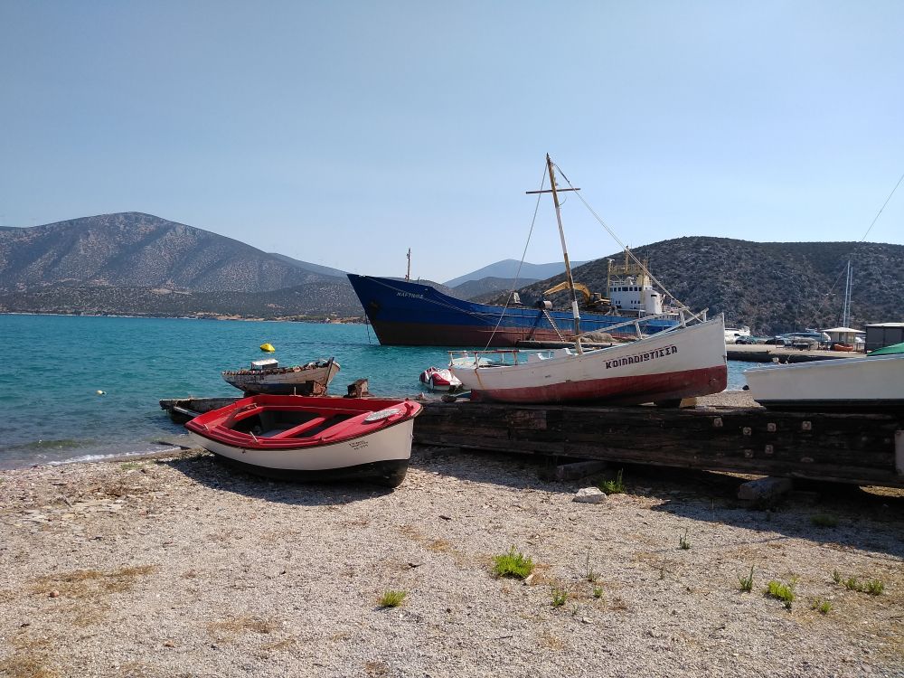 fishing boats in a beach in Greece