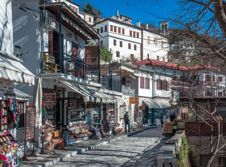 Traditional little shops with goods line the main street in Makrinitsa village in pelion Greece. 