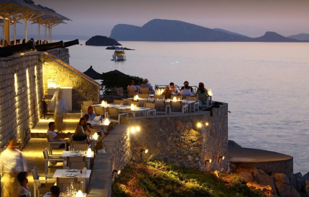 Sunset restaurant in hydra island in Greece.