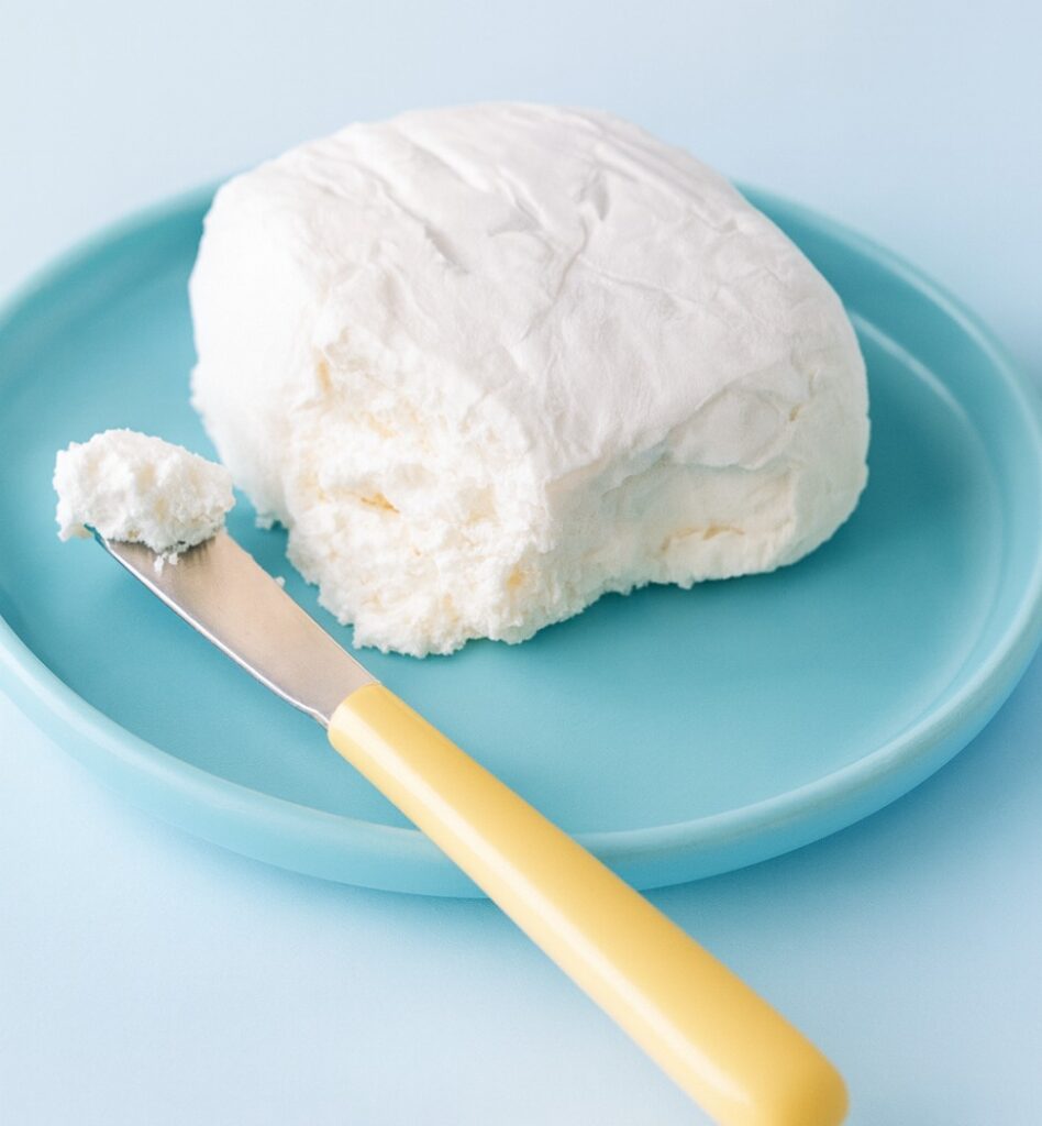 Fresh xynomizithra cheese served on a plate, showcasing traditional flavors of Amorgos Greece—perfect for an Amorgos travel guide food section.