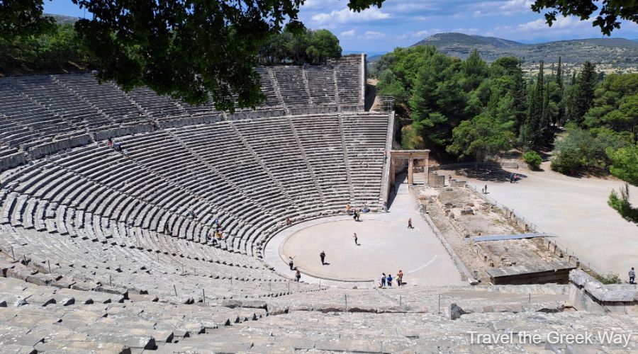 The ancient theater of Epidaurus and some people on the stage. Greece for mobility-impaired.