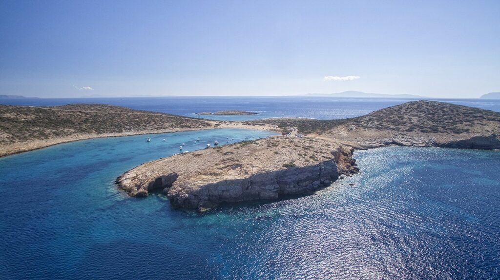 Kalotaritissa Beach taken from a drone in a sunny day in Amorgos Island Greece.