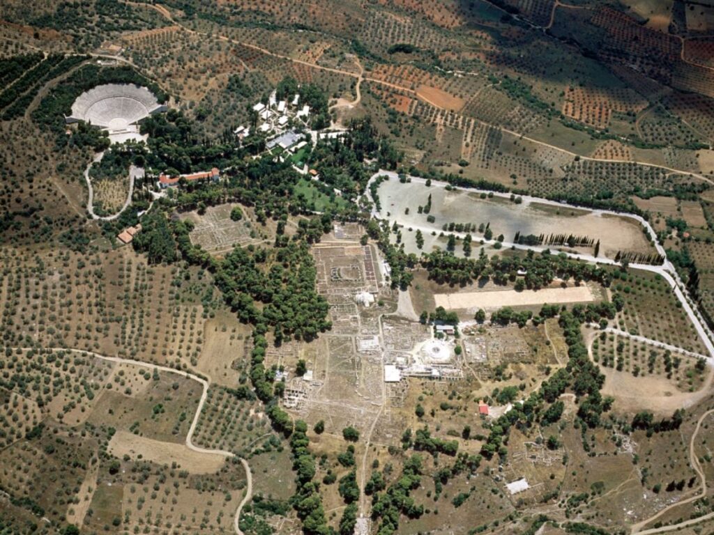 Aerial photo of theAsklepios Sanctuary, with the theater on the bottom left, the large stadium, the Tholos, the museum and other buildings