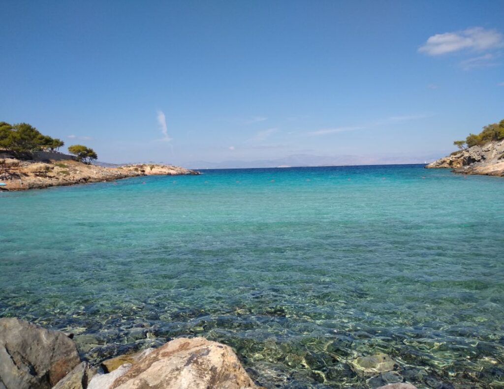 turquoise Aponissos beach and rocks on Agistri island