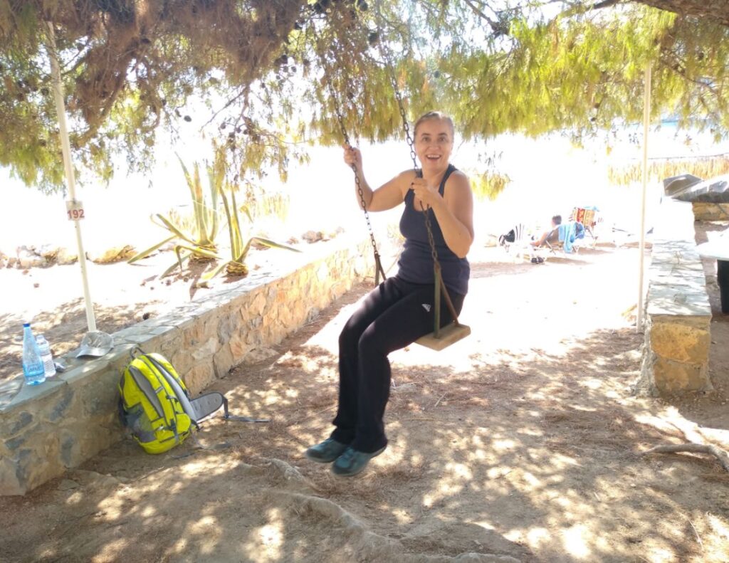 Evgenia in Agistri island on a swing