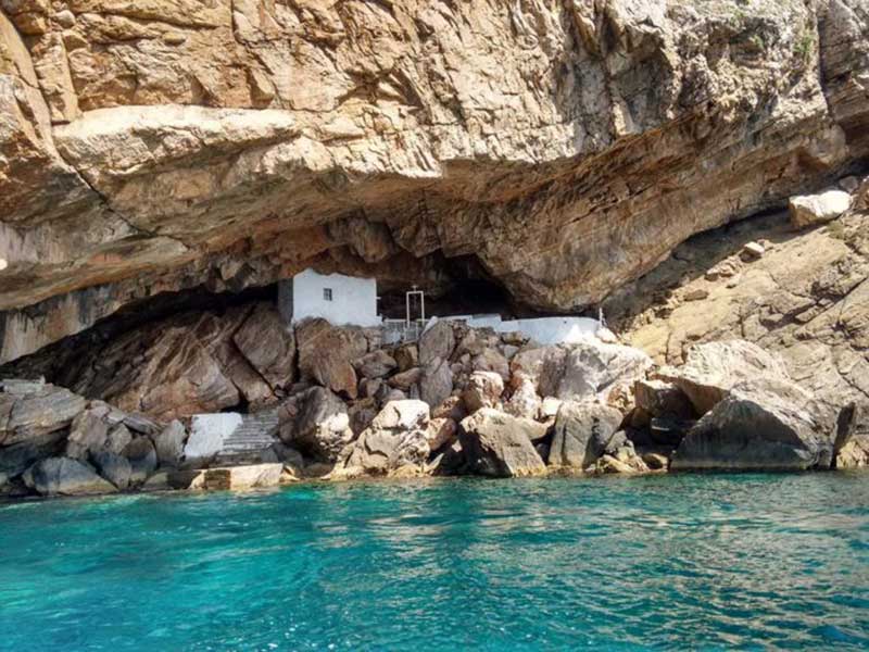 A seaside chapel called Agios Stefanos in the rocks in Syros Island.
