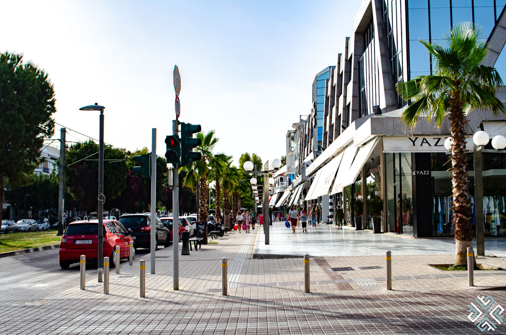 Athens Riviera. Glyfada shopping area a pedestrian with shops and cars