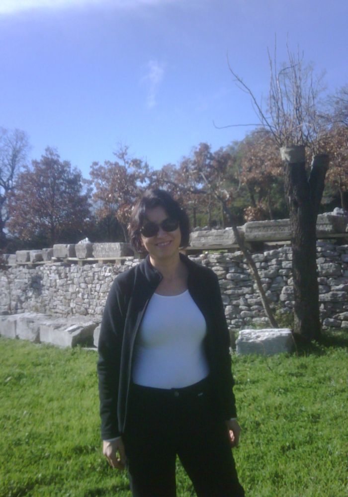 Evgenia at the Temple of Apollo Epicurius. Temple of Apollo Epicurius at Bassae of Phigaleia.