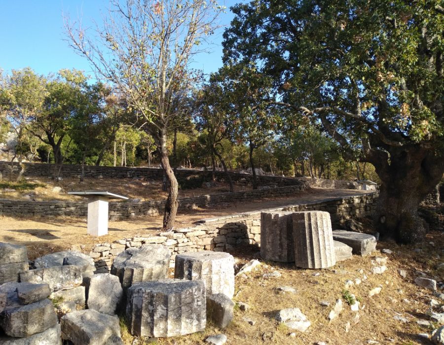 Ruins around the Temple of Apollo with pathways. Temple of Apollo Epicurius at Bassae of Phigaleia.