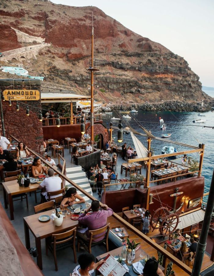 An overview of Ammoudi Fish Tavern by the Santorini beach. 