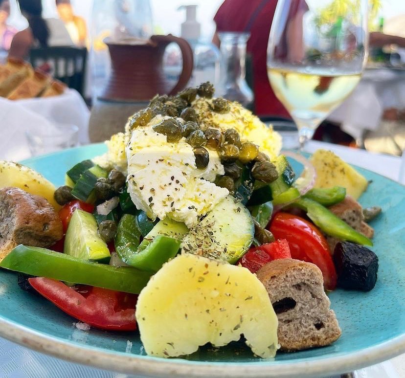 A dish of Cretan salad in a traditional tavern. 