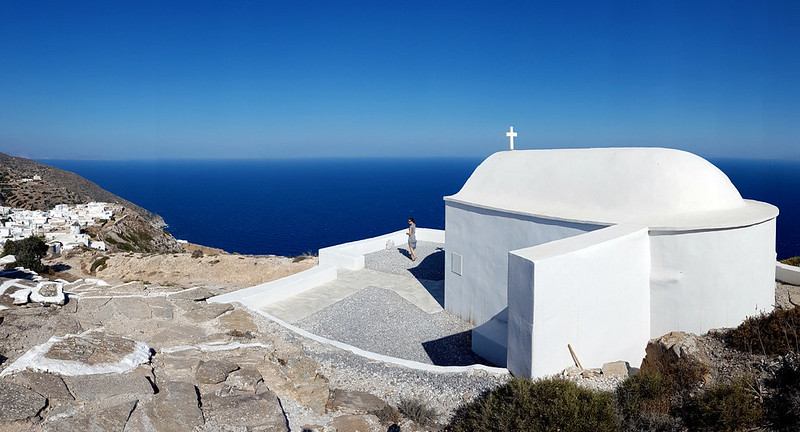 Whitewashed Panagia Pantohara Chapel  in a sunny day. Sikinos Greece.
