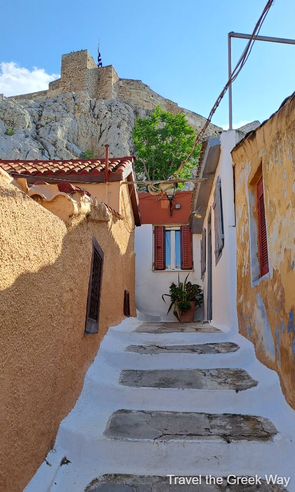 View from a valley of Anafiotika under Acropolis. Christmas in Athens Greece.