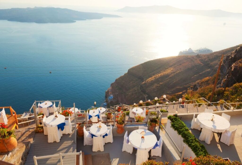 Ambrosia Restaurant  terrace in Santorini Island with caldera views. Santorini best diners.