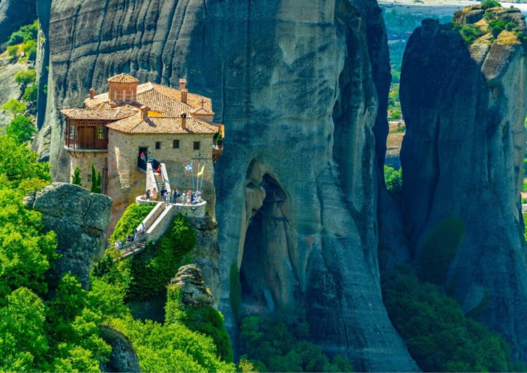 Meteora Monasteries Roussanou entrance and many people.