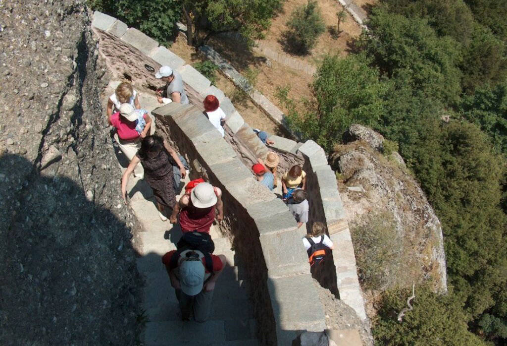 Meteora Monasteries people climbing the stairs.