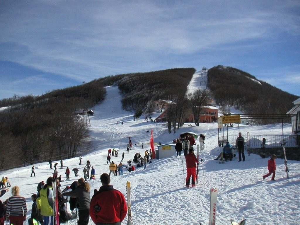 Ski Resort Agriolefkes with snow and a lot of skiers in Pelion Greece.