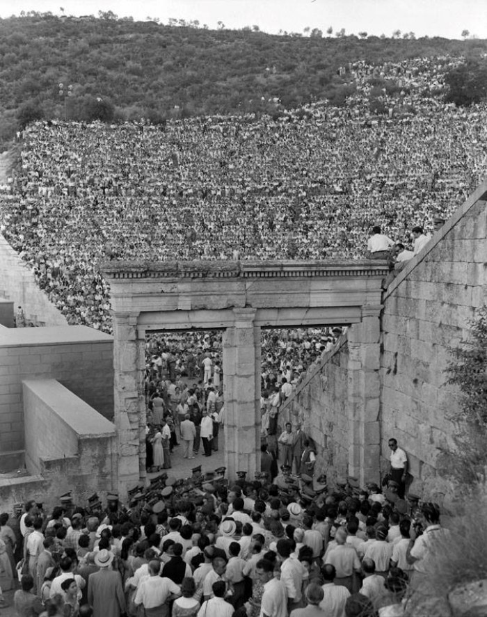 Epidaurus Festival in 1956 and hundred of people in Theater of Epidaurus Peloponnese.