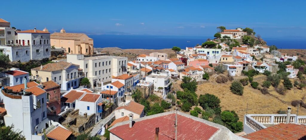 Ioulida town in kea islands with houses with tiled roofs.