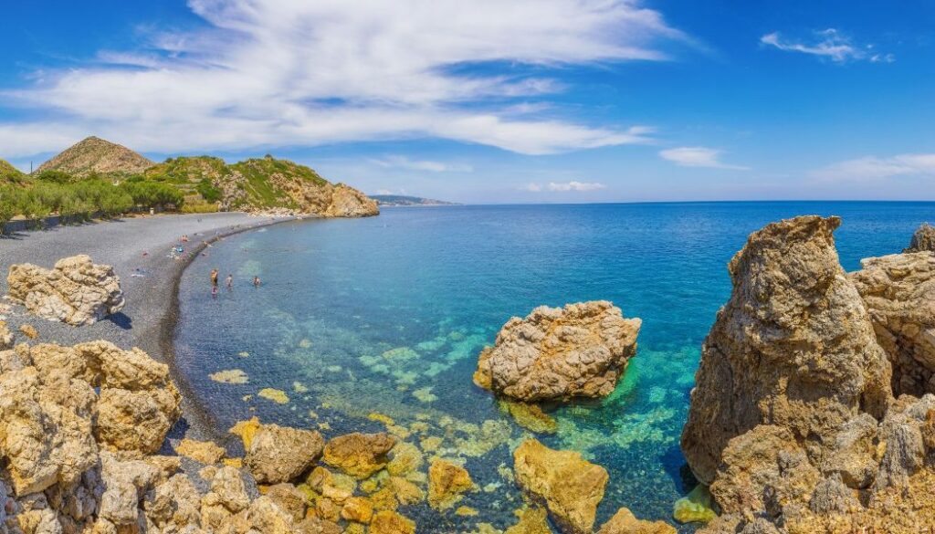 Chios Greece, the black pebbled beach of Mavra Volia. 