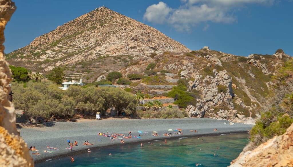 Mavra Volia beach with swimmers. 