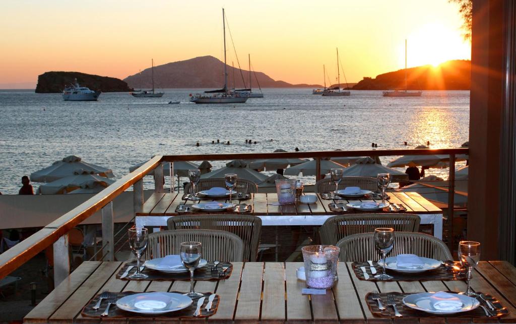Best Athens Beach Hotels: Aegeon Beach restaurant terrace with sunset