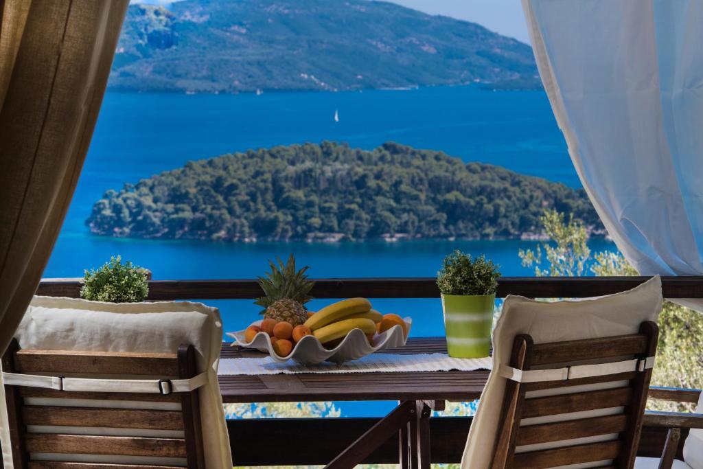 A view to the sea from a balcony, Villa Meliti in Nydri, Lefkada. Best Places to Go to Greece in April.