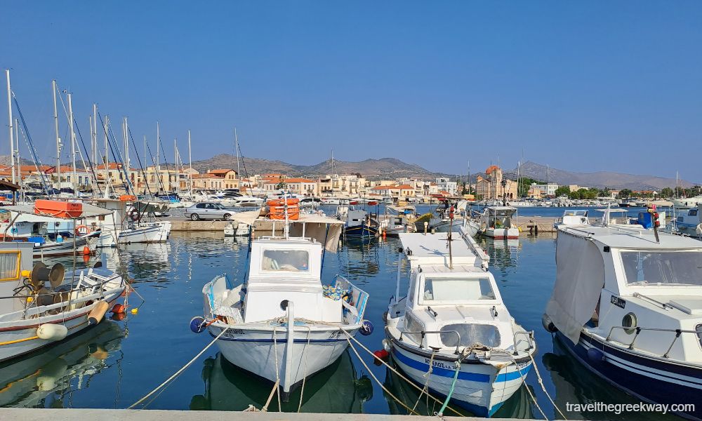The port of Aegina island with many fishing boats and yachts.