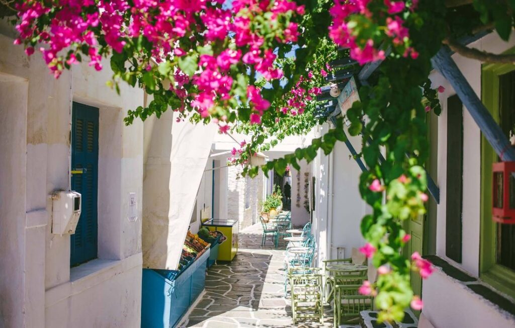 Beautiful alley with flowers in Kythnos Greece