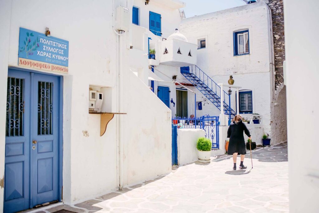 A woman walks in CHora Kythnos Greece
