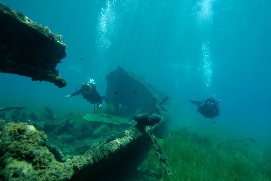 Divers to a sunken boat in Kythnos Greece