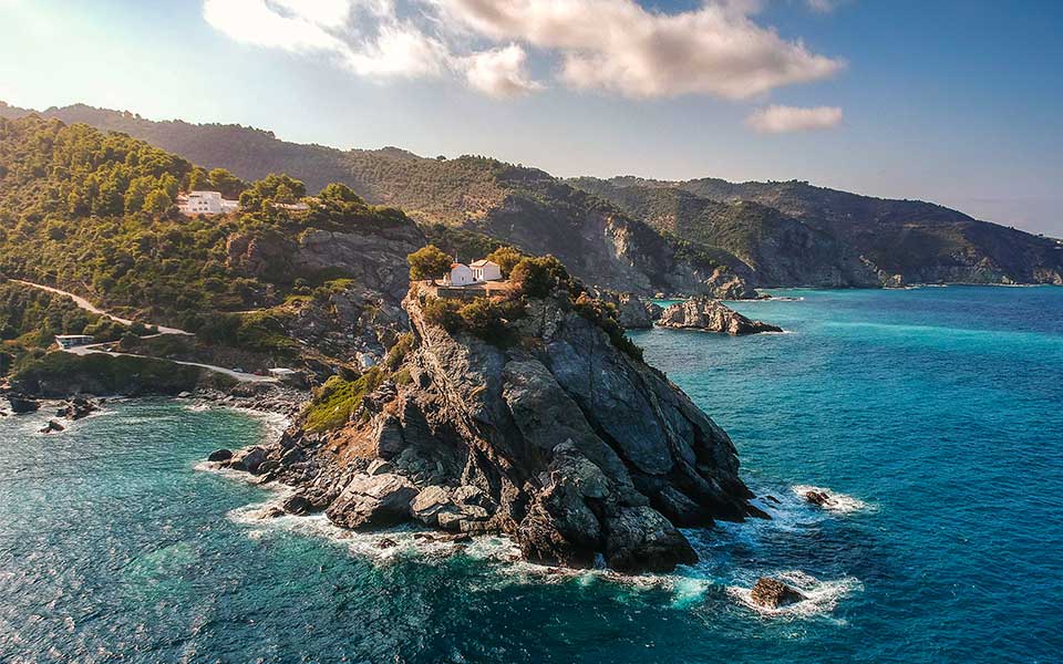 Agios Ioannis Kastri rock and church in, Skopelos Greece