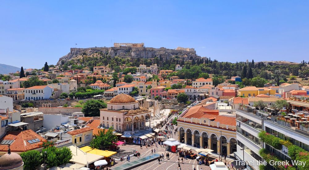 Overview of Monastiraki, Hadrian's Library entrance and Acropolis Hill in Athens. 