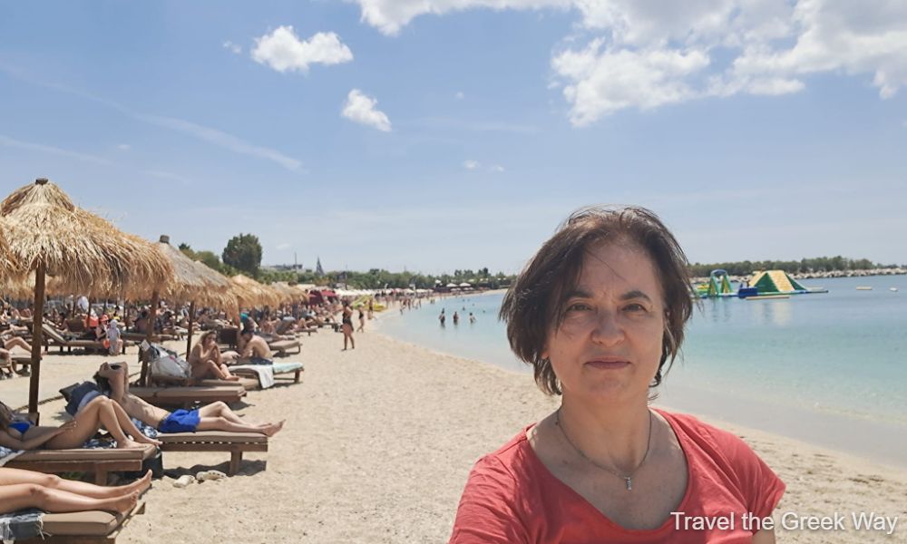 Evgenia of Travel the Greek Way in front of Voula beach in Athens Riviera. 