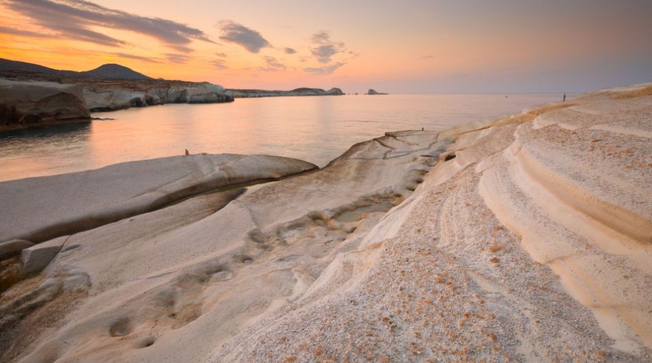 Sarakino at Dusk with a beautiful sunset 
in Milos Greece.