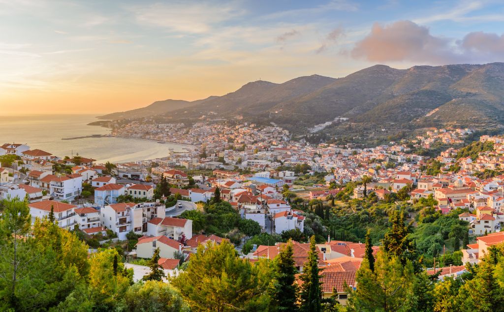 Things to Do in Samos Greece overniew of Vathy town in sunset