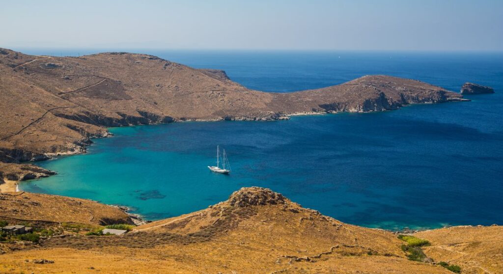 A sailing yacht in a small dry bay on Serifos island in the Cyclades Greece. 