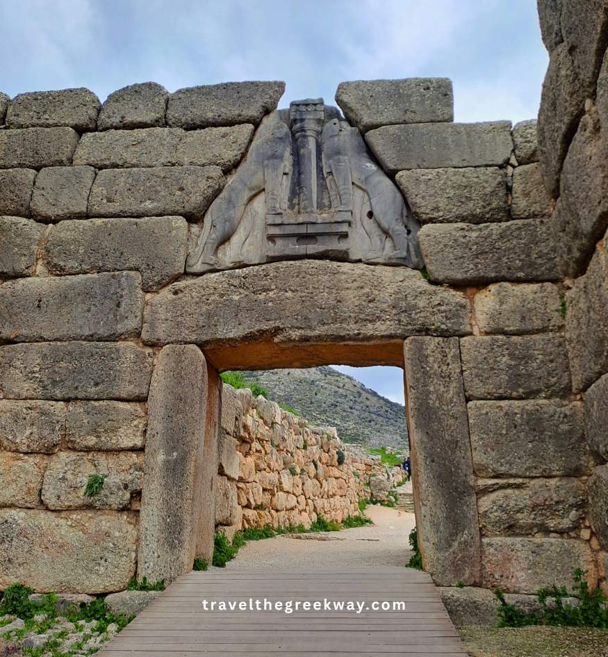 etailed view of the monumental Lion Gate at Ancient Mycenae, showcasing the massive limestone relief of two lions in the Argolis region.